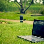 laptop in the grass